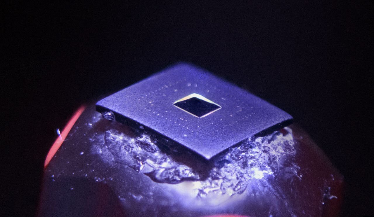Exposed silicon die under a macro lens